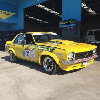  Yellow Holden Torana SLR 5000 classic performance car with race decals